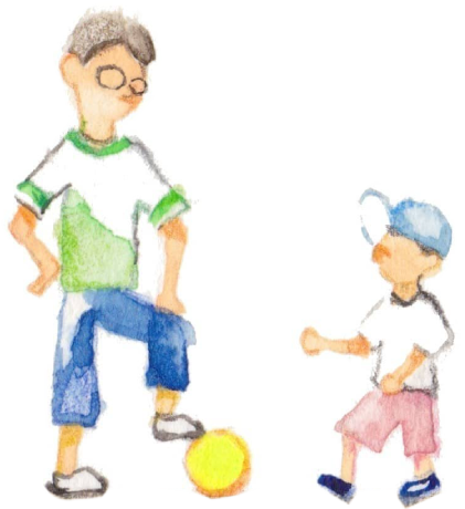 サッカーをする親子